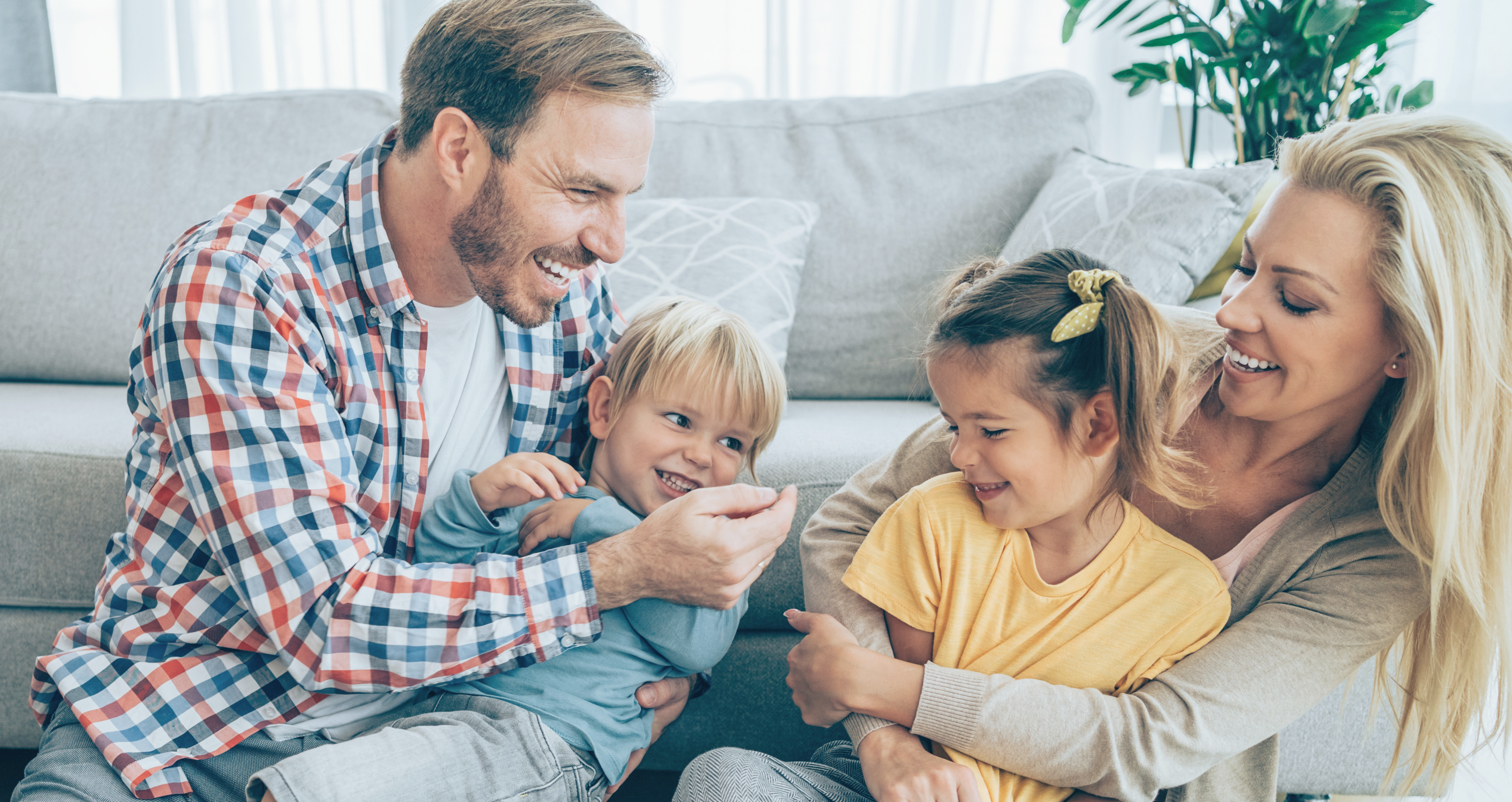A family smiling together before a dental visit